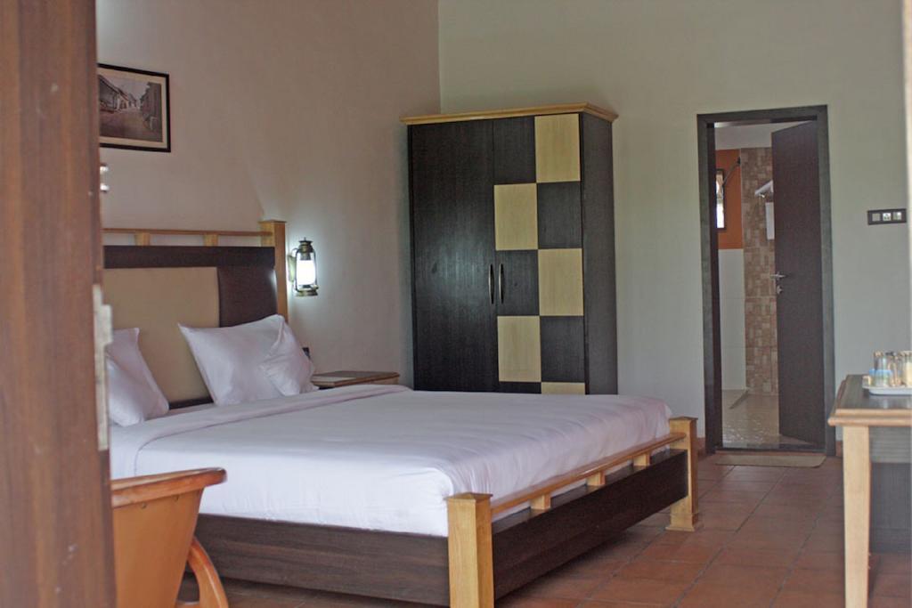 Eka Resort Hassan Rom bilde