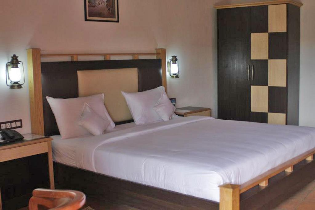 Eka Resort Hassan Rom bilde